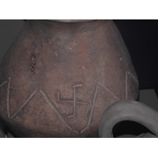Clay vessel with swastika design